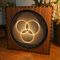 Geometric Walnut & Mirror Glass Wall Light, Handmade LED Mood Lamp, Modern Ambient Warm Glow Wall Decor - Triad Weave